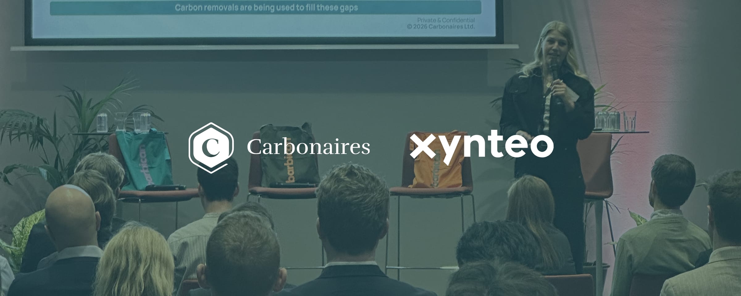 Carbonaires and Xynteo partnership event at the Barbican, London — panel discussion on the role of carbon markets in net-zero strategies